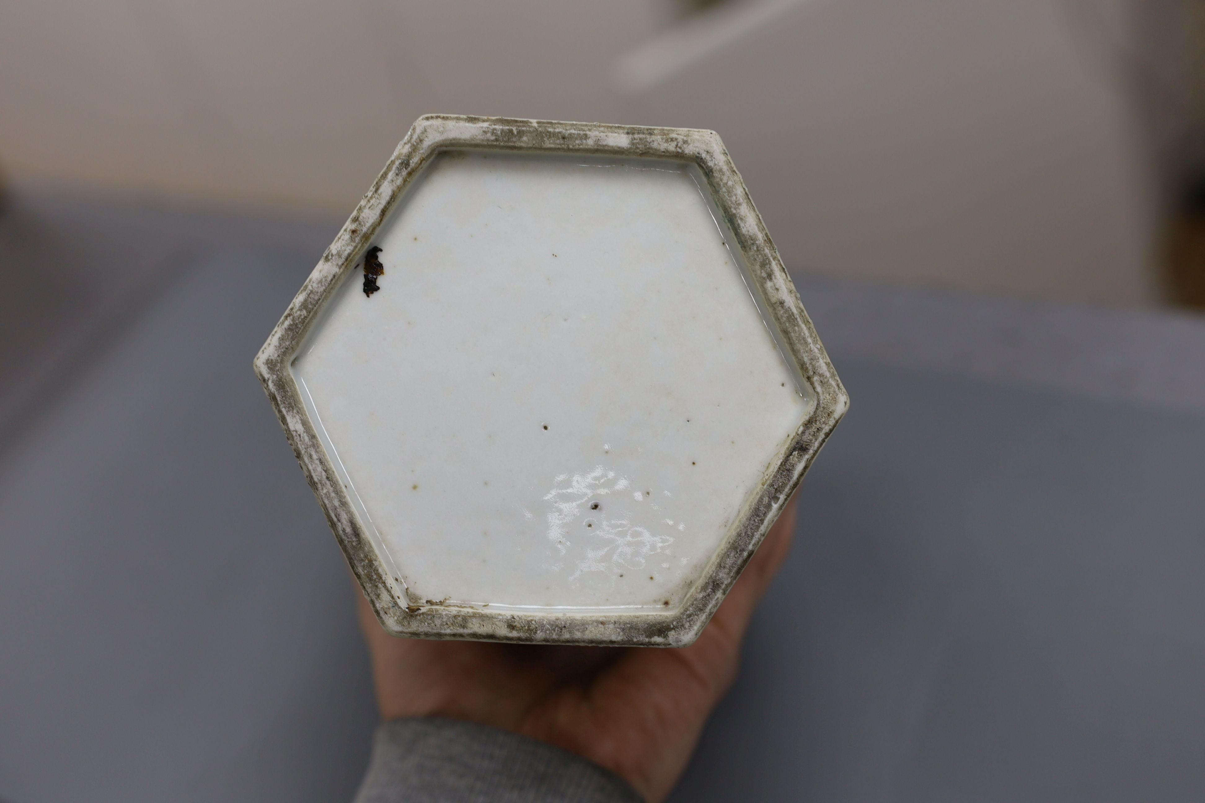 A Chinese blue and white hexagonal hat stand, late 19th century, 27.5 cms high, 27.2 cm high, hairline crack to one side of body